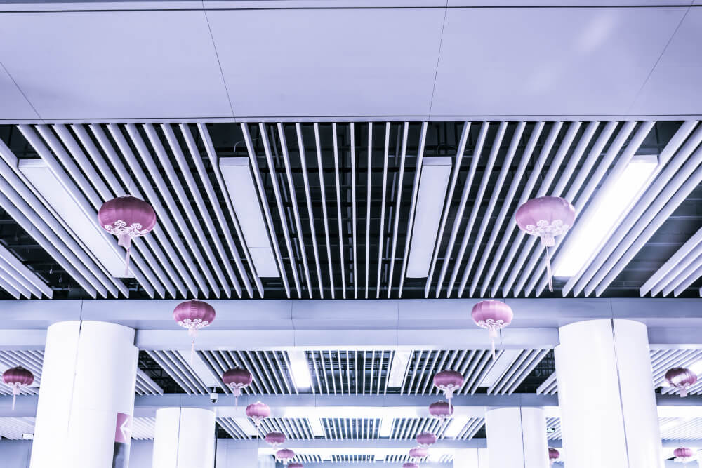 Professional ceiling system installed in a commercial space to enhance acoustics, improve workflow comfort, and support modern design needs.